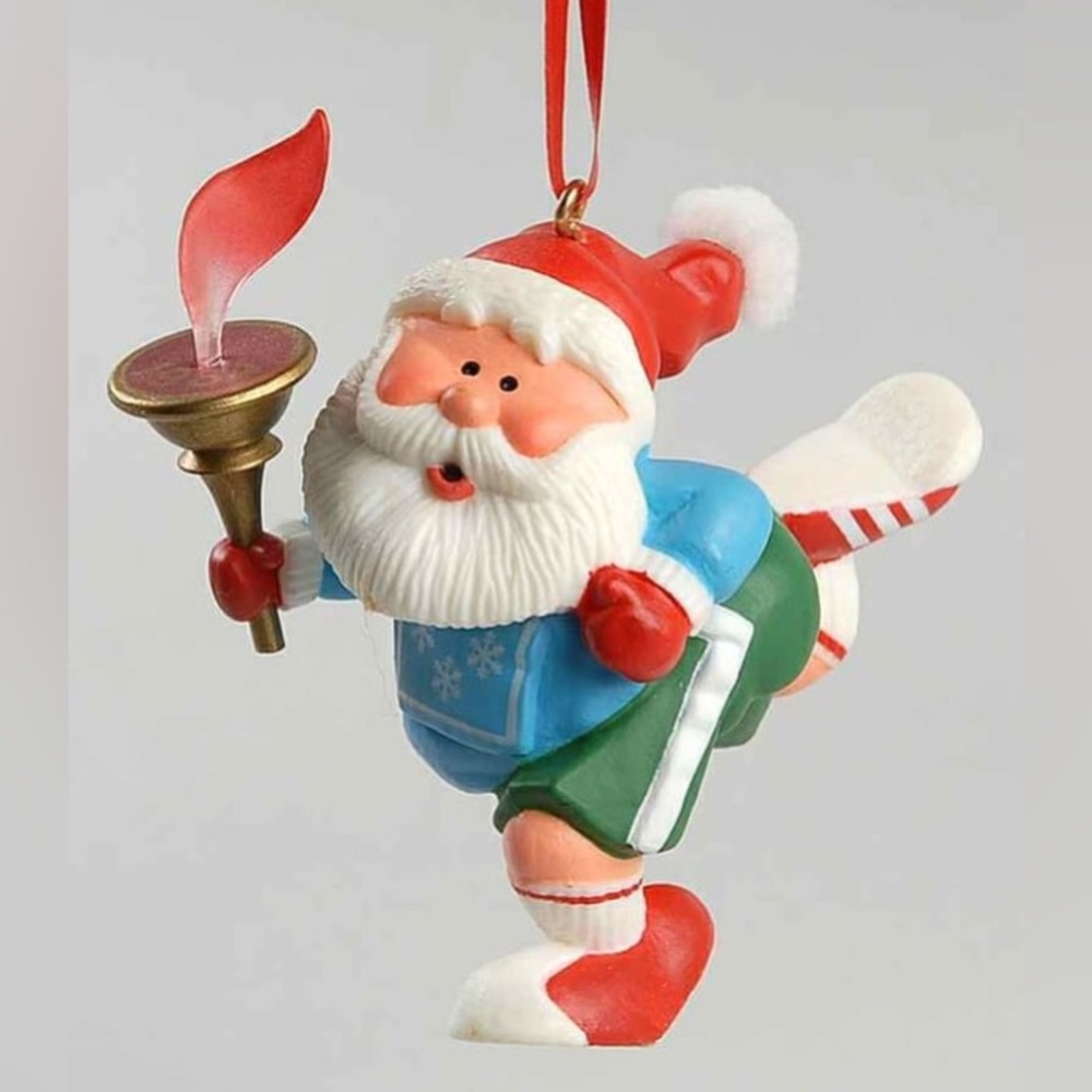 Vintage 1984 Hallmark Christmas Ornament.  Olympics marathon torch Santa.